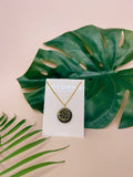 OLIVIA BLACK LARGE NECKLACE - Black & Gold Leaf Circle Pendant on Long Chain.